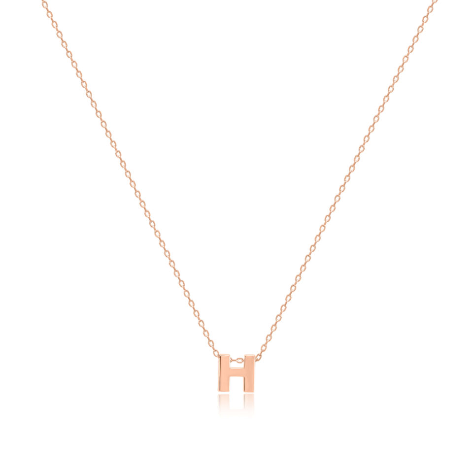 Złoty łańcuszek z zawieszką w kształcie litery "H"