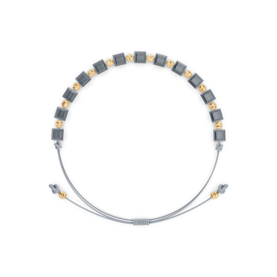 Transparentes graues Fadenarmband mit Gold