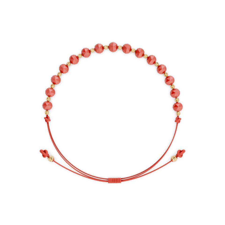 Armband aus rotem Faden mit goldenen Perlen